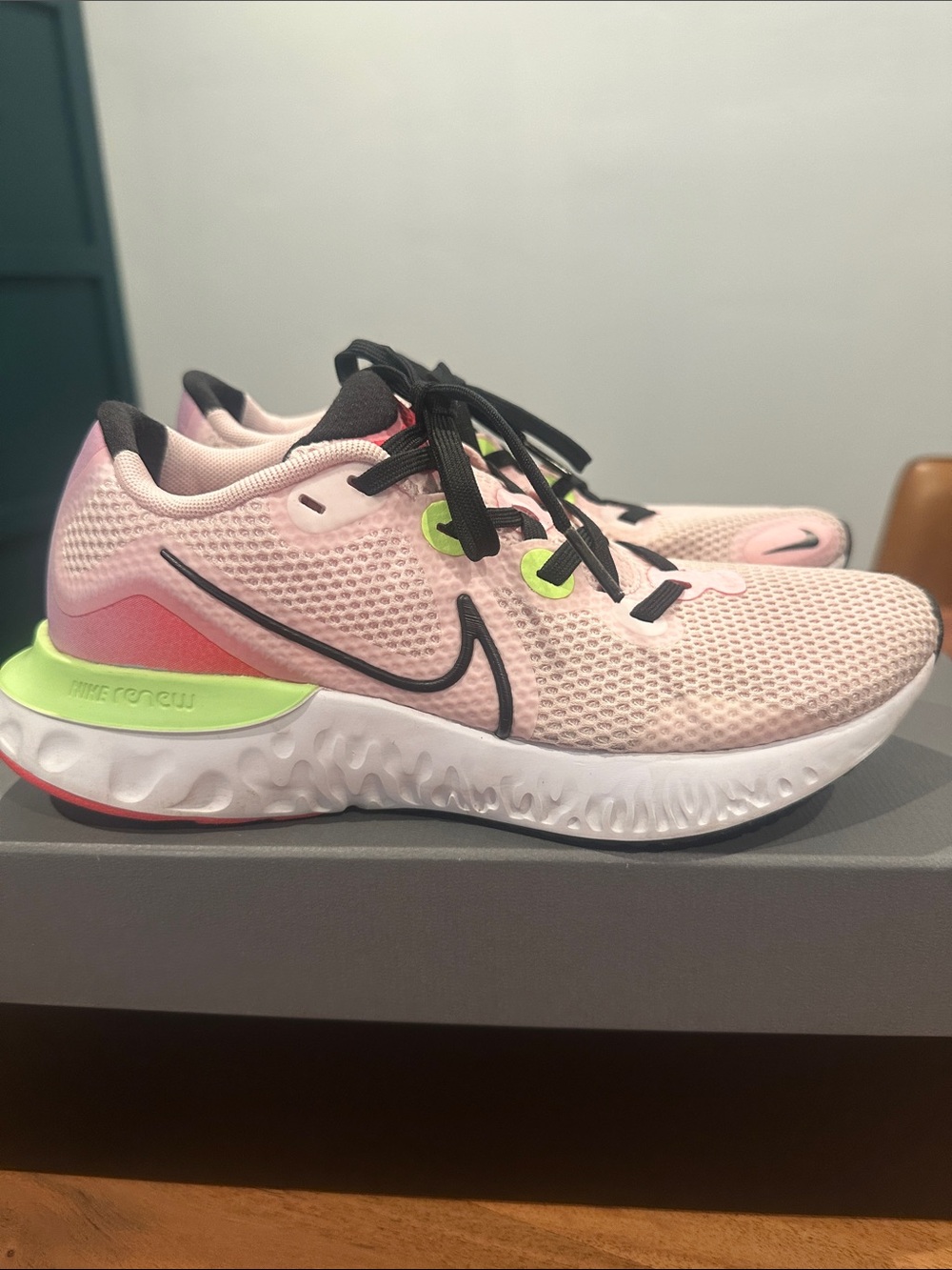 Nike Women’s Pink and Black Renew Running Shoes with Neon Green Accents